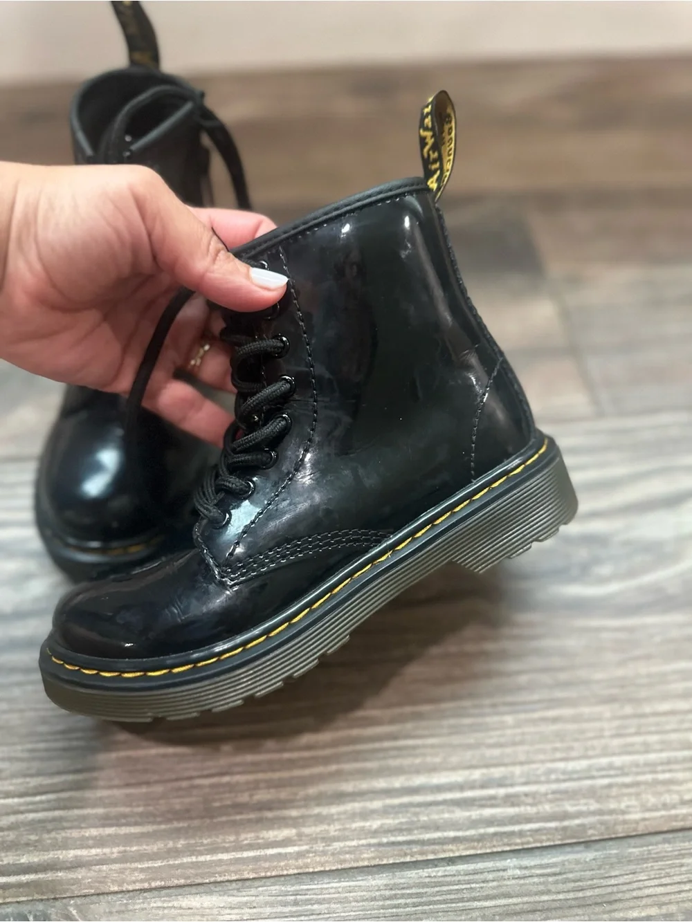Dr. Martens Kids Black Patent Lace-Up Combat Boots with Yellow Heel Loop